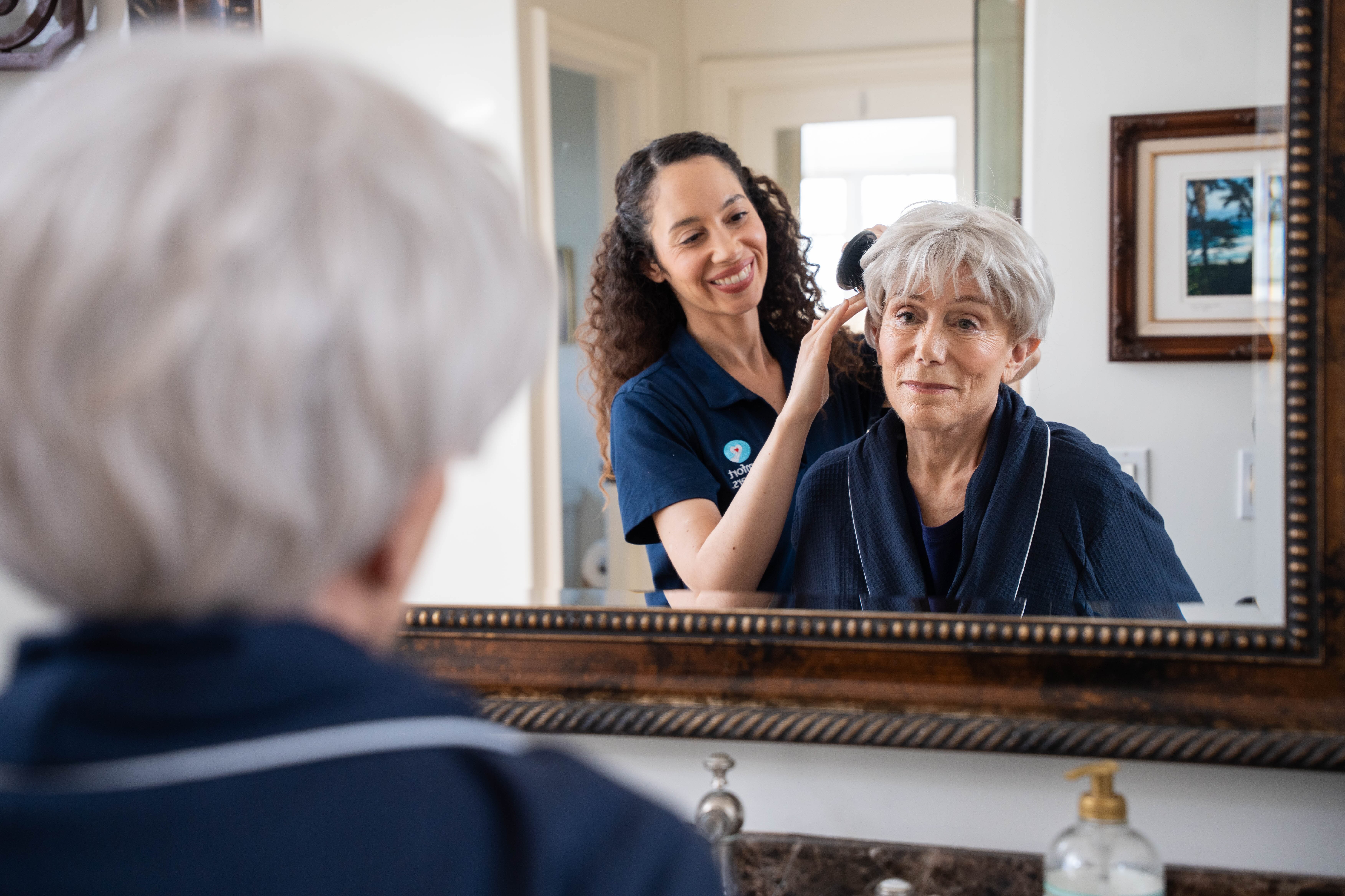 Family member supporting senior loved one recognizing memory loss signs